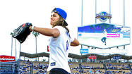 Photo Gallery: Olympian Kate Hansen throws out first pitch of Dodger game